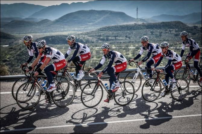 The Lotto Belisol bunch snake their way up the climb