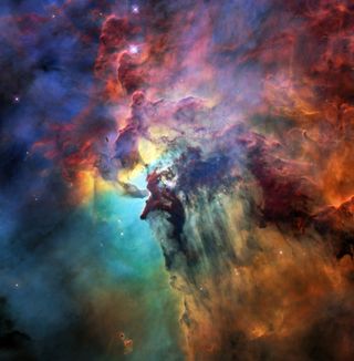 A Hubble Space Telescope image shows the Lagoon Nebula, part of the small portion of matter in the Milky Way that isn't made of dark matter.