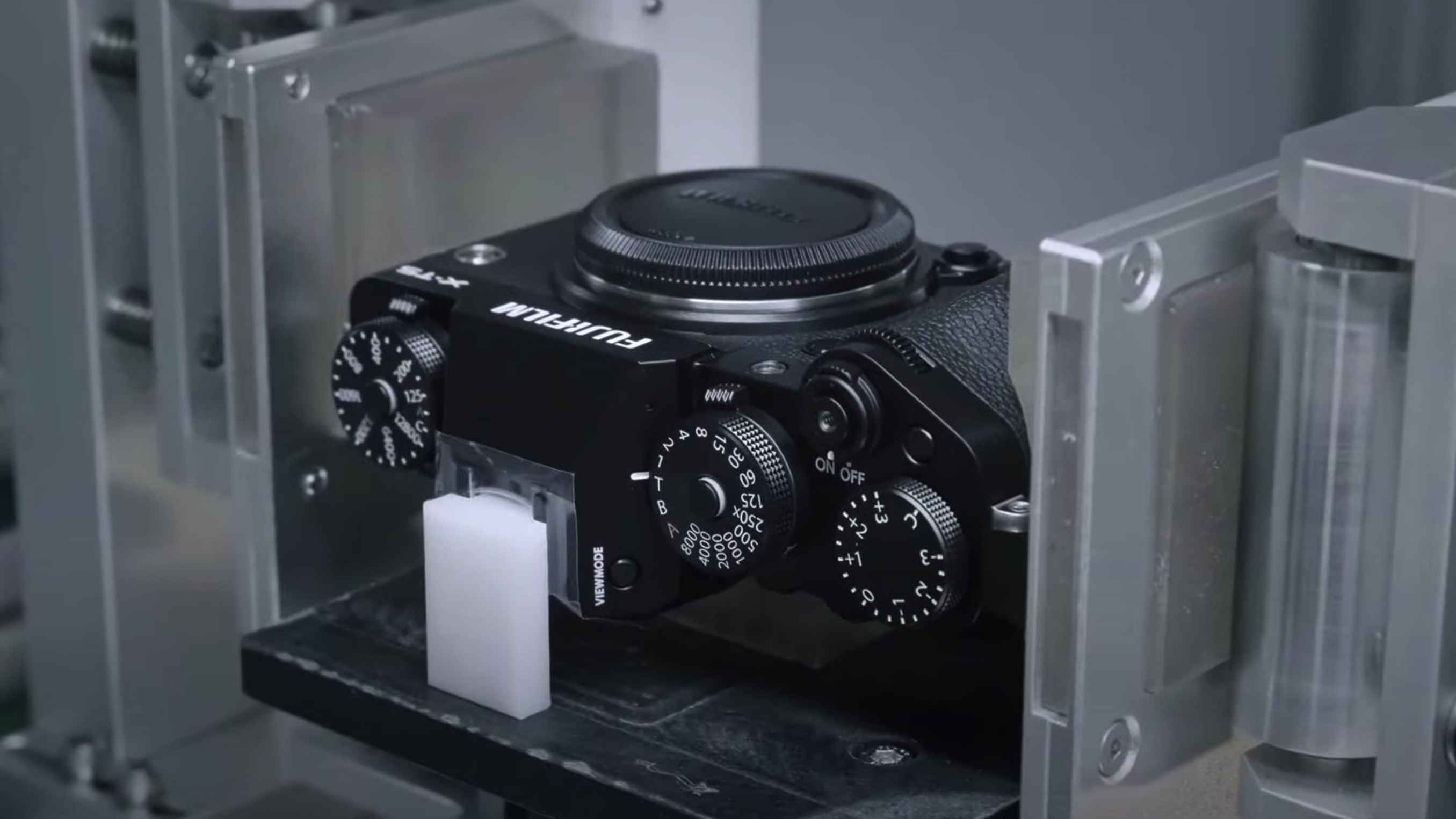 A Fujifilm X-T5 being assembled in a factory