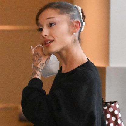 Ariana Grande styled a polka-dot bag and straight-leg jeans with heeled ballet flats