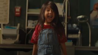 Maia Kealoha stands screaming in delight in the animal shelter in Lilo and Stitch.