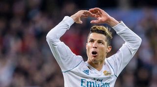 MADRID, SPAIN - APRIL 11: Cristiano Ronaldo of Real Madrid celebrates his side going through to the Semi-Finals of the UEFA Champions League after the UEFA Champions League 2017-18 quarter-finals (2nd leg) match between Real Madrid and Juventus at Estadio Santiago Bernabeu on 11 April 2018 in Madrid, Spain. (Photo by Power Sport Images/Getty Images)