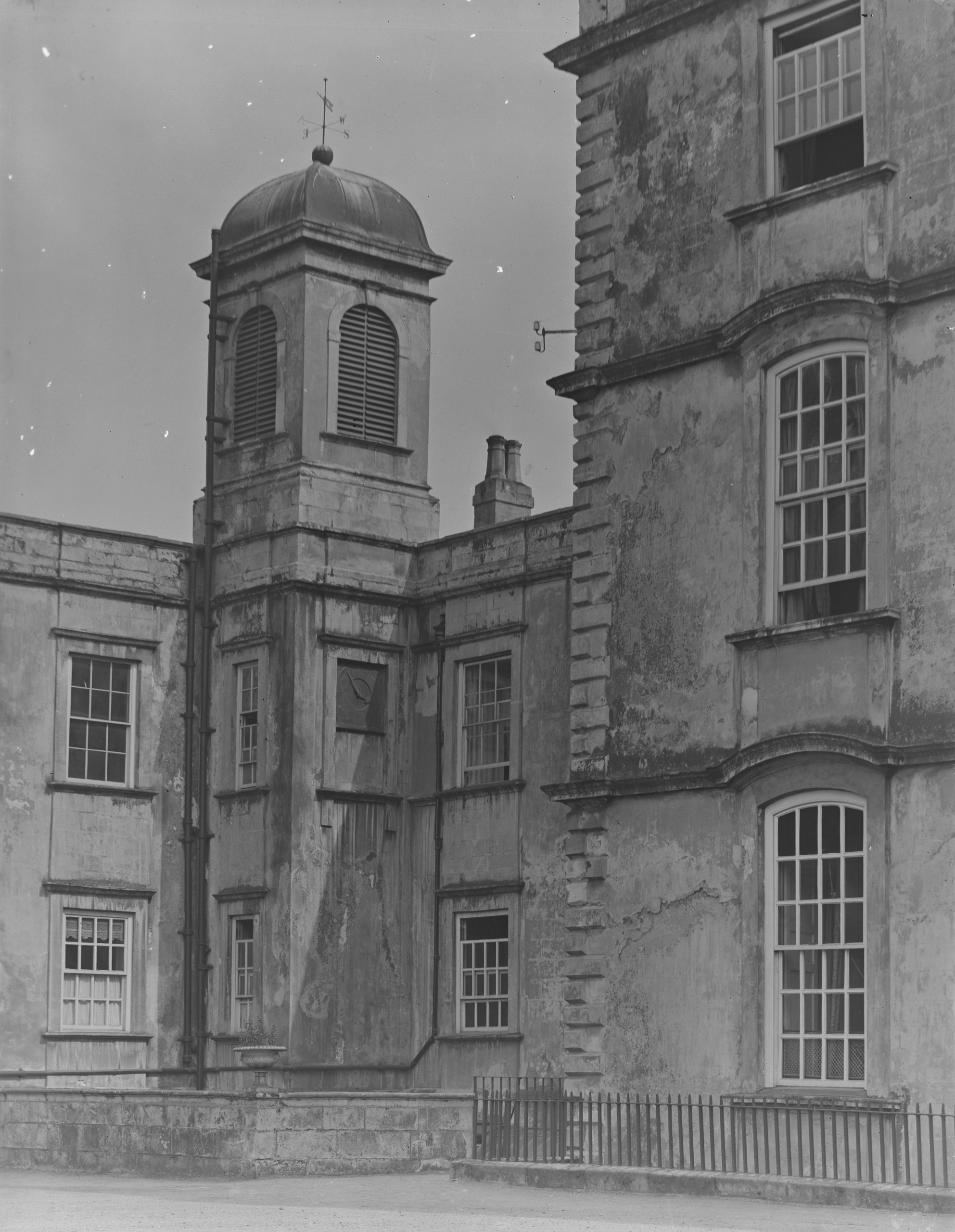 An external shot of Sprotborough Hall, showing the decaying stucco work