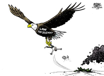 Editorial cartoon U.S. Law enforcement bald eagle pressure cooker