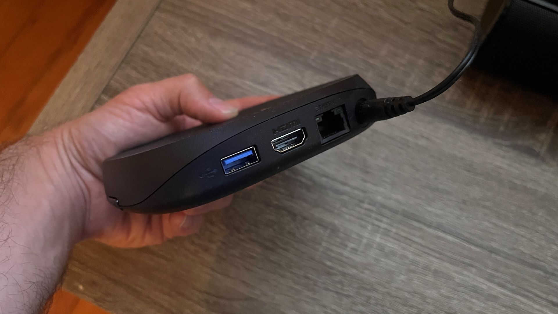 Roku Ultra (2024) held in hand showing ports