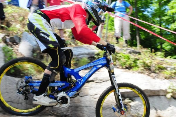 Canadian Champion Clair Buchar (Chain Reaction) flying down the rock section.