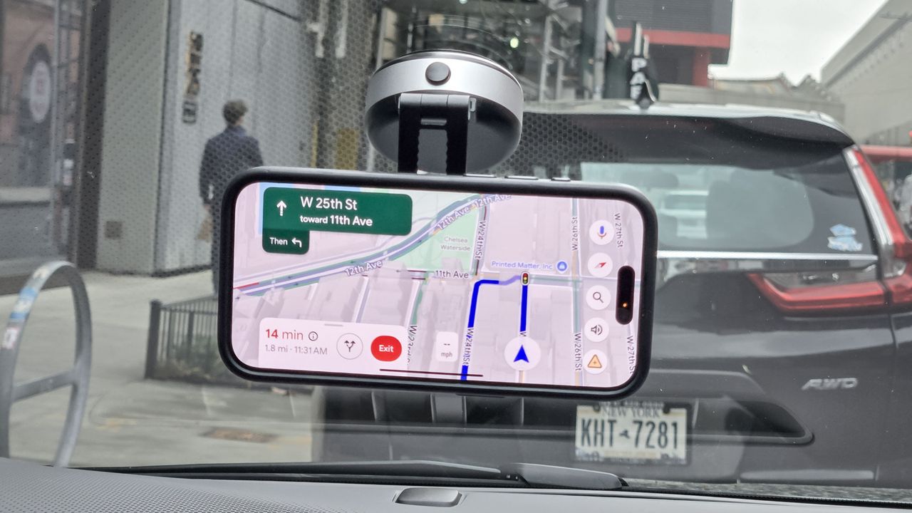 Portable Vacuum Magnetic Phone Holder Stand against windshield.