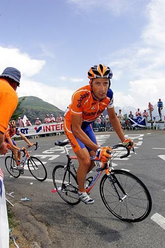 Juan Antonio Flecha (Rabobank) just sneaks past a Dutch fan cheering on the home team.