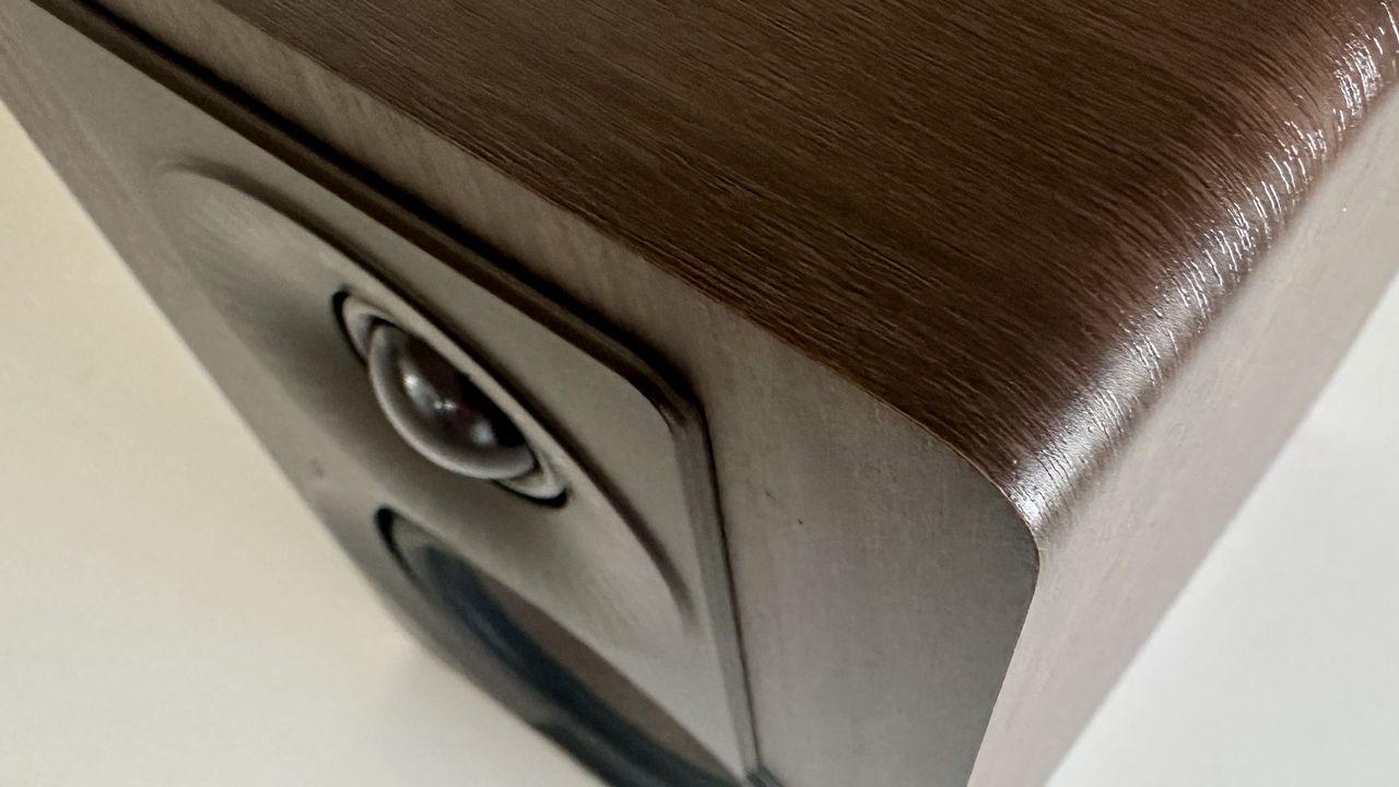 Bird's eye shot of the front panel of a Dali Kupid bookshelf speaker.