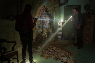 (L to R) Anna Torv as Tess and Pedro Pascal as Joel surrounded by entrails of a dead Infected in The Last of Us season 1 episode 1