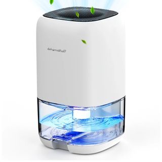 A white dehumidifier filled with water