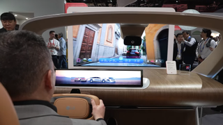 A screenshot from a Tom's Guide YouTube video showing someone testing out LG's Vision AI Mobility Concept