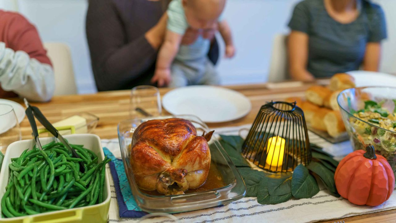 photo of family at Thanksgiving table