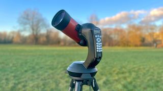 The celestron nexstar 4se set up outside in a field