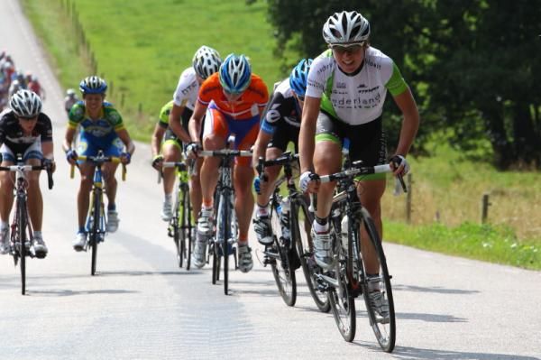 Annemiek Van Vleuten (Nederland Bloeit) leading, in the newly formed break.