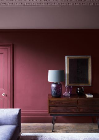 deep plum shade walls in a traditional living room