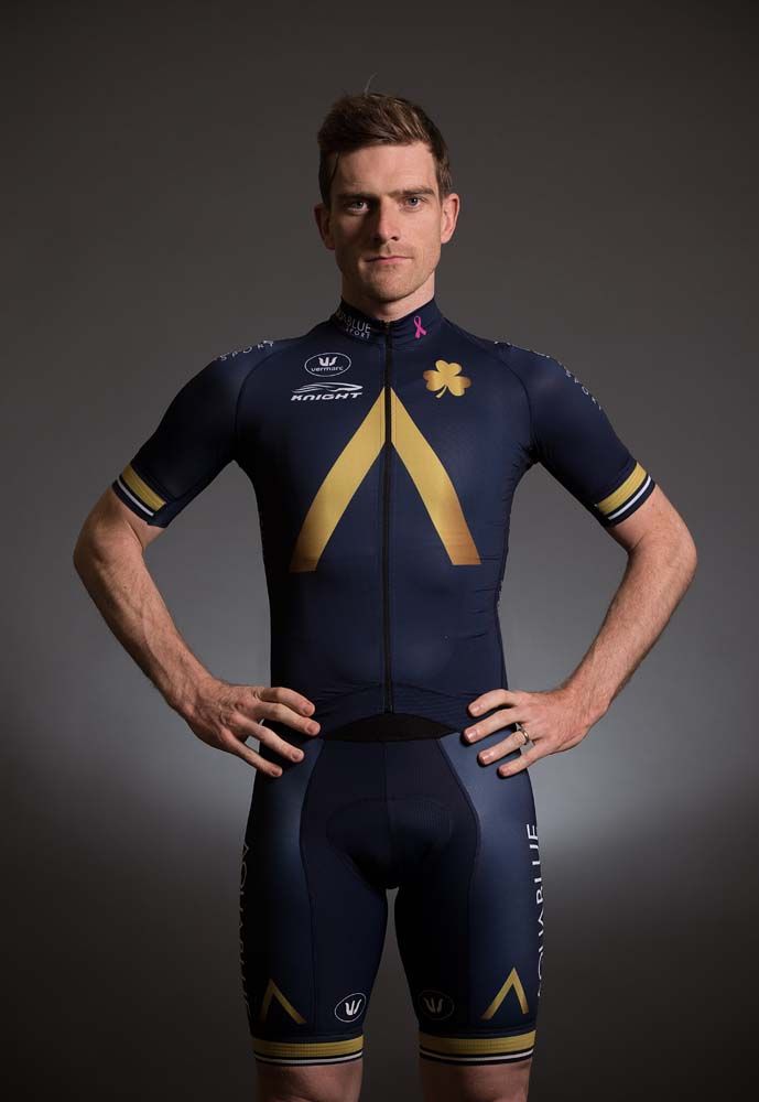 Martyn Irvine proudly shows the 2017 Aqua Blue Sport jersey