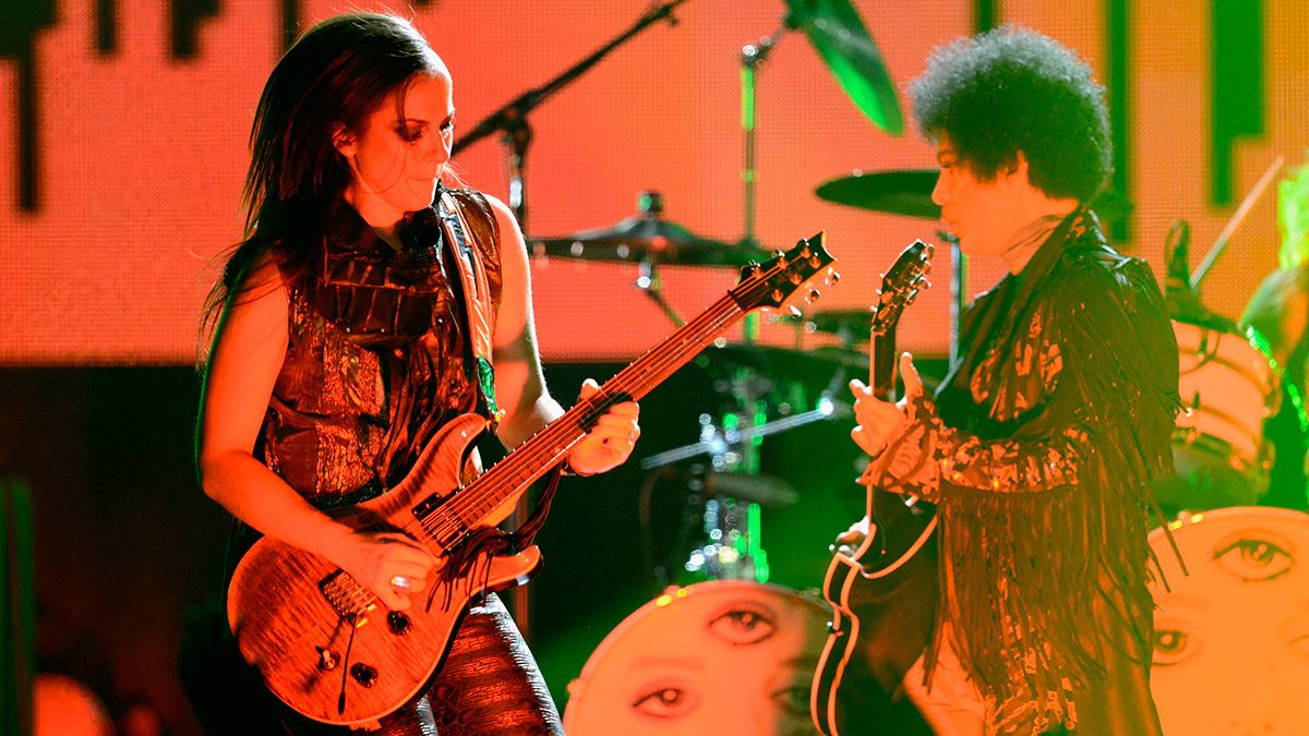 Prince (R) and Donna Grantis perform onstage during the 2013 Billboard Music Awards at the MGM Grand Garden Arena on May 19, 2013 in Las Vegas, Nevada