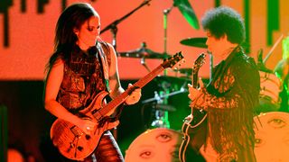 Prince (R) and Donna Grantis perform onstage during the 2013 Billboard Music Awards at the MGM Grand Garden Arena on May 19, 2013 in Las Vegas, Nevada