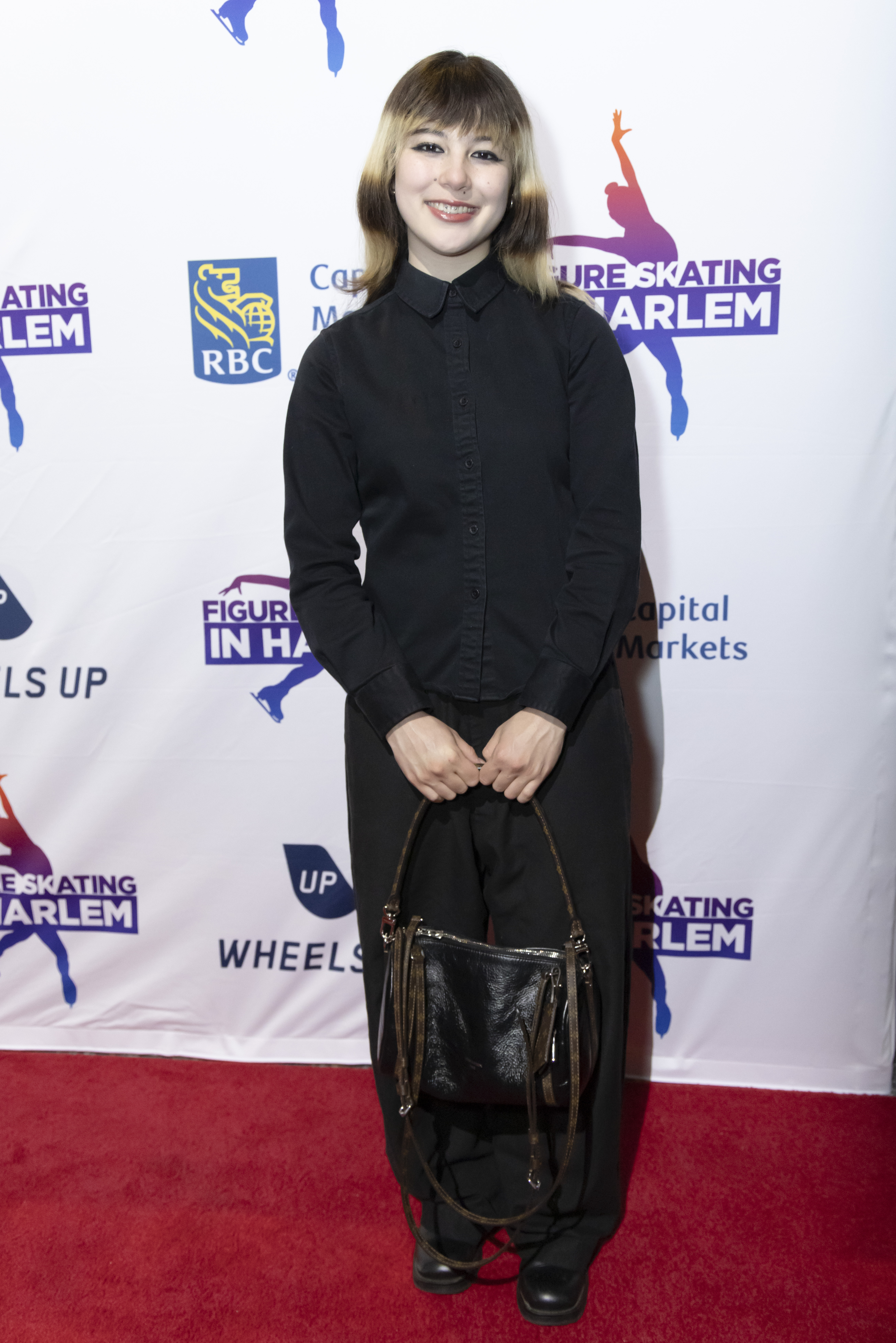 Alysa Liu walked the red carpet with Louis Vuitton's Express PM handbag