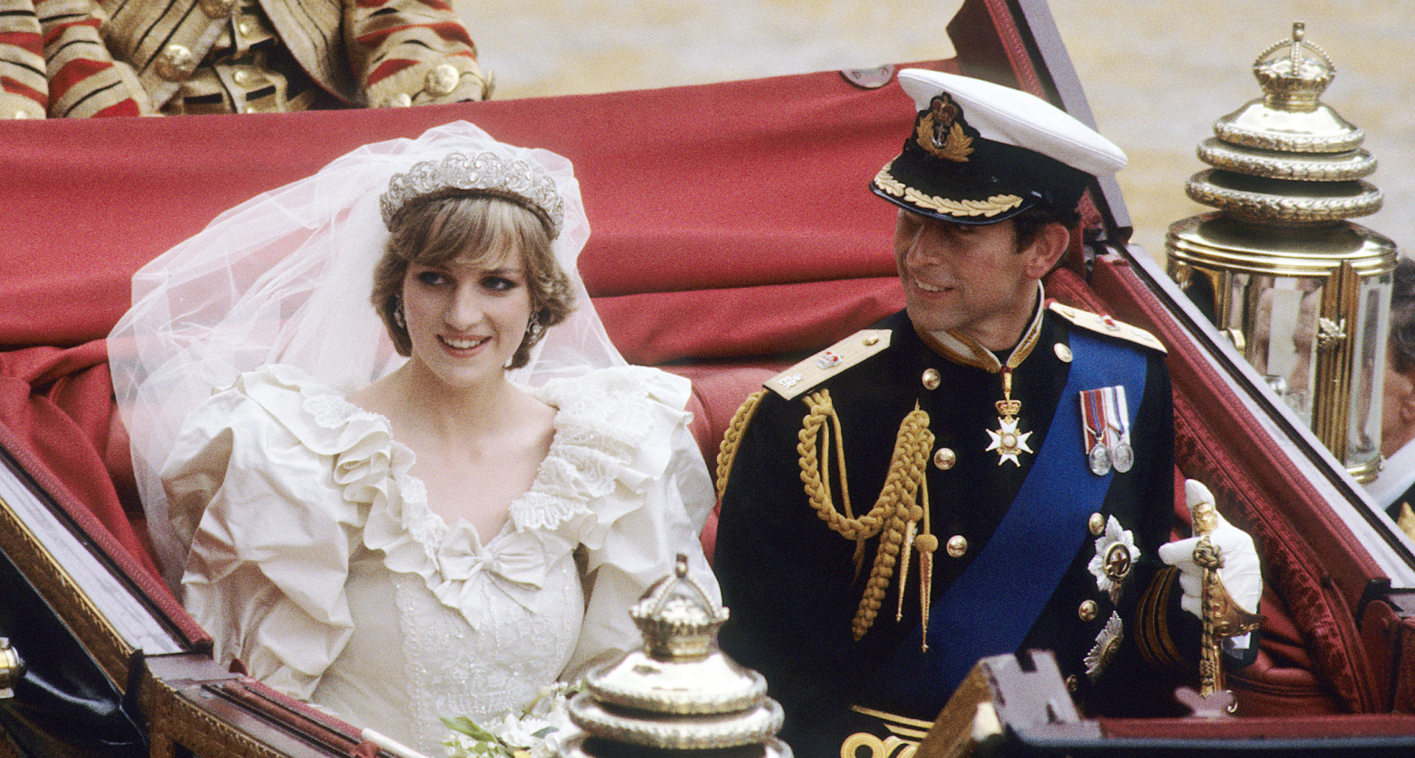 Princess Diana sitting in a carriage with Prince Charles