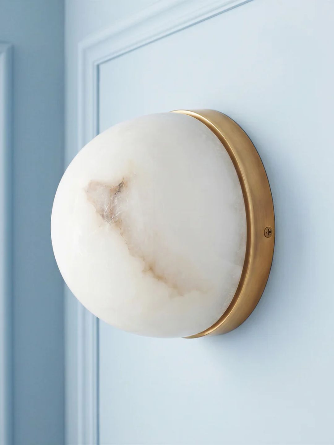 An alabaster wall light from Pooky