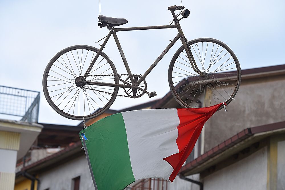 A bicycle monument and Italian flag