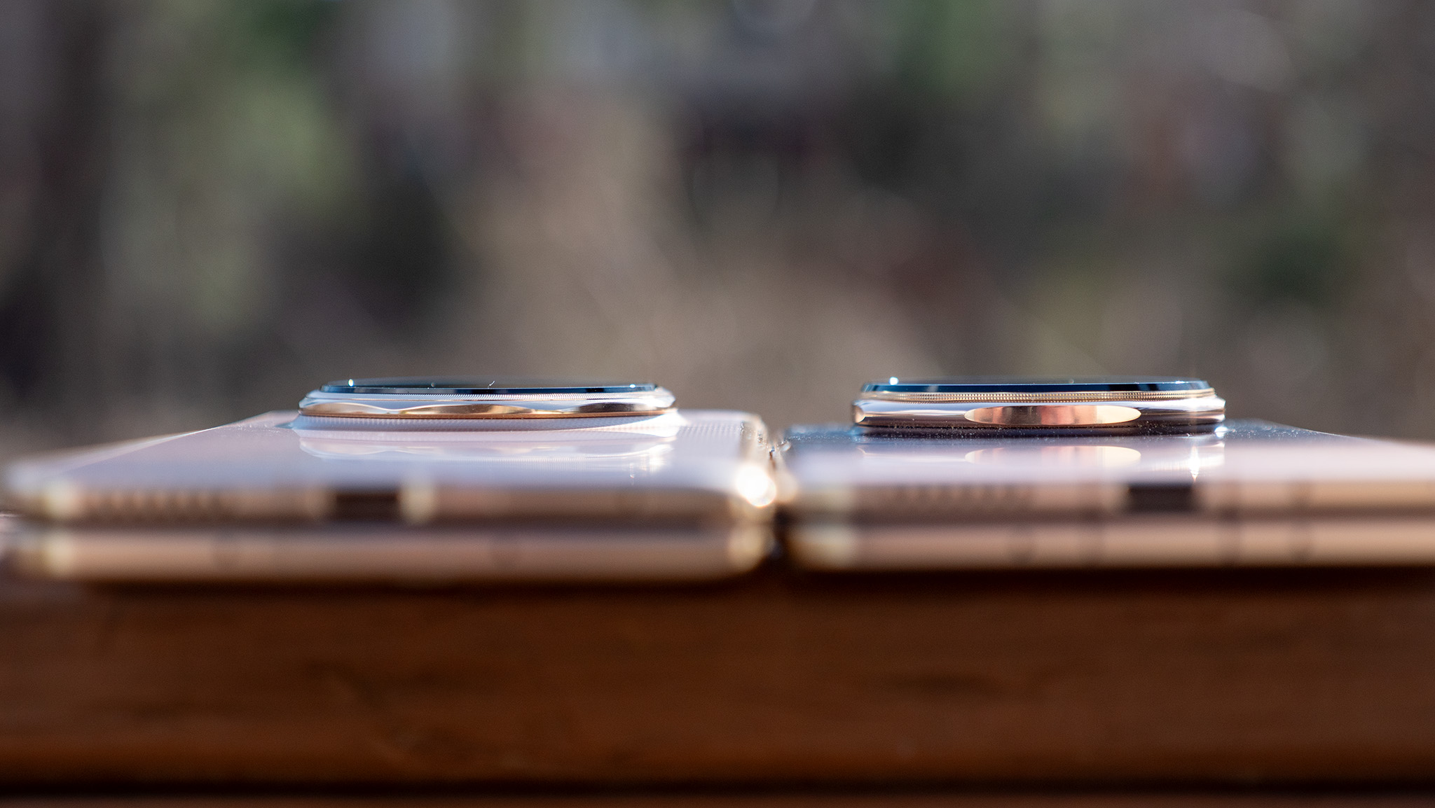 Comparing the backs and camera islands of the Honor Magic V6 (left) and Magic V5 (right)