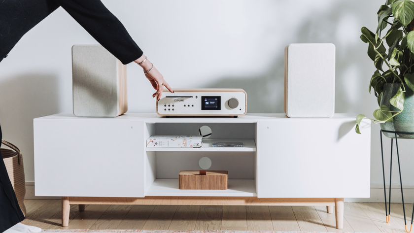 Pure Classic Stereo DAB+ radio on a hi-fi table in a white room