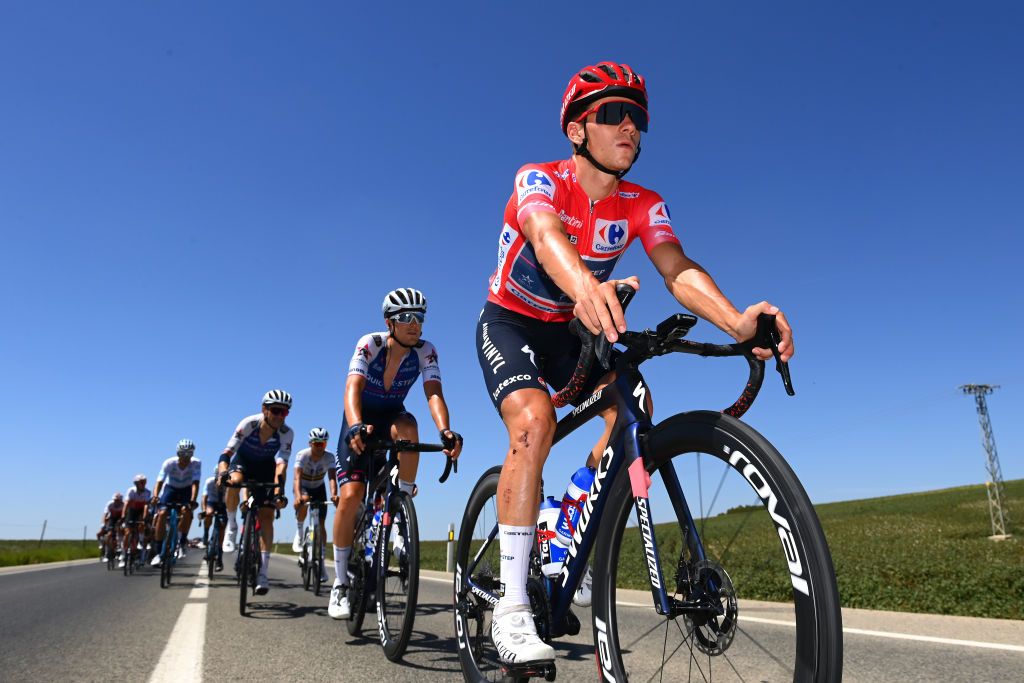 TOMARES SPAIN SEPTEMBER 06 Remco Evenepoel of Belgium and Team QuickStep Alpha Vinyl Red Leader Jersey competes during the 77th Tour of Spain 2022 Stage 16 a 1894km stage from Sanlcar de Barrameda to Tomares LaVuelta22 WorldTour on September 06 2022 in Tomares Spain Photo by Tim de WaeleGetty Images