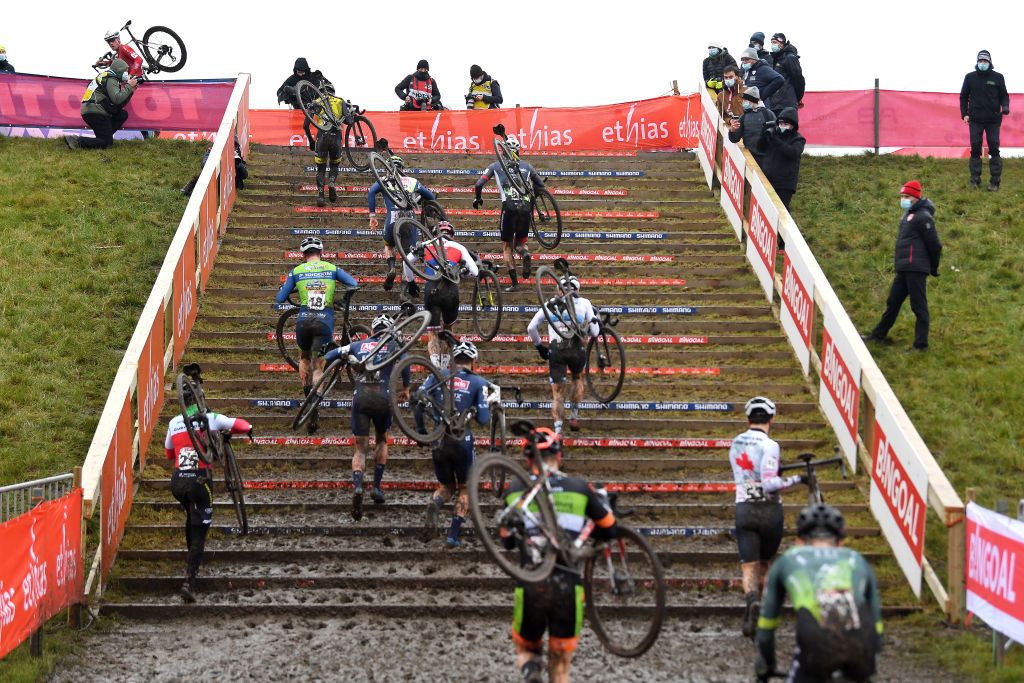 DENDERMONDE BELGIUM DECEMBER 26 A general view of the peloton competing in a stairs sector during the 2nd Dendermonde UCI CycloCross Worldcup 2021 Mens Elite CXWorldCup UCIcyclocrossWC on December 26 2021 in Dendermonde Belgium Photo by Luc ClaessenGetty Images