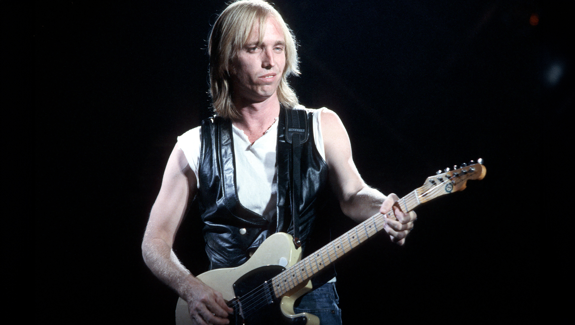 Tom Petty photographed onstage circa 1980 playing a Fender Telecaster