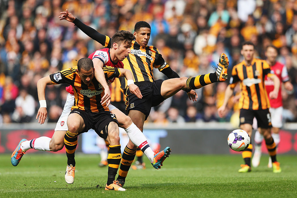 Liam Rosenior and Curtis Davies during the Barclays Premier League match between Hull City and Arsenal at KC Stadium on April 20, 2014 in Hull, England.