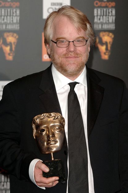 Phillip Seymour Hoffman with his Oscar