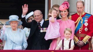 Queen Elizabeth II, Prince Philip, Duke of Cambridge, Catherine, Duchess of Cambridge, Princess Charlotte of Cambridge, Prince George of Cambridge and Prince William, Duke of Cambridge look on from the balcony during the annual Trooping The Colour