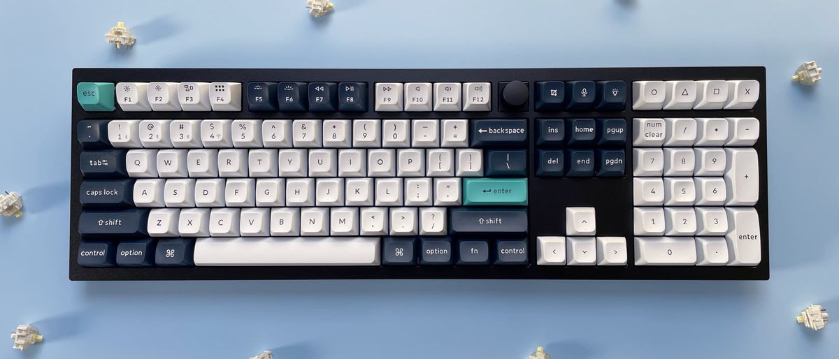 The Keychron Q6 Max mechanical keyboard against a blue background.