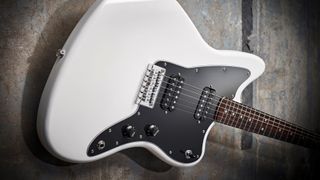 Cloesup of the body of a white Squier Affinity Jazzmaster