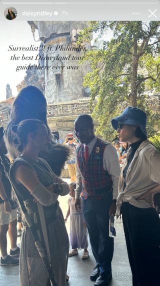 Daisy Ridley chatting with the Rey and Chewbacca cast members at Disneyland