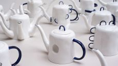 white bone china teapots with blue handles 