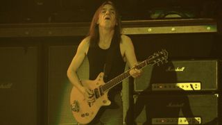 Malcolm Young, with his trademark Gretsch 6131 Jet Firebird, performs with AC/DC at Olympiahalle on March 27, 2009 in Munich, Germany