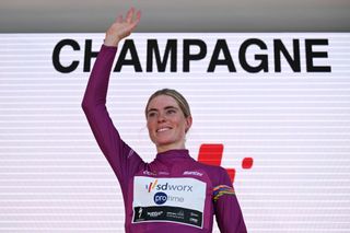 CHAMPAGNE SWITZERLAND JUNE 18 Demi Vollering of The Netherlands and Team SD WorxProtime celebrates at podium as Piurple UCI Womens WorldTour Leader Jersey winner during the 4th Tour de Suisse Women 2024 Stage 4 a 1275km stage from Champagne to Champagne UCIWWT on June 18 2024 in Champagne Switzerland Photo by Tim de WaeleGetty Images
