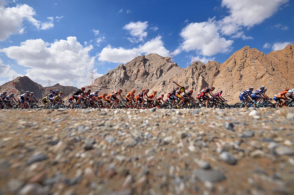 The pack rides during the second stage of seventh cycling Tour of Oman between the Omantel Head office on the outskirts of Muscat