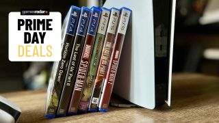 PS5 console with games stacked alongside it and Prime Day deals badge