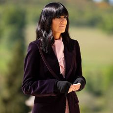 Claudia winkleman wearing red blazer