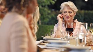 Dorinda Medley at her dinner table at Bluestone Manner on The Real Housewives of Ultimate Girls Trip