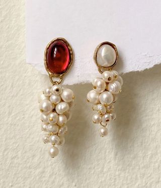 Pearl earrings designed to look like bunches of grapes