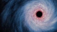 A swirl of blue and red light around a dark black hole in the right side of the image sits on a white grid of blocks showing the fabric of spacetime