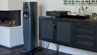 Linn 343 floorstanding speaker next to a hi-fi system