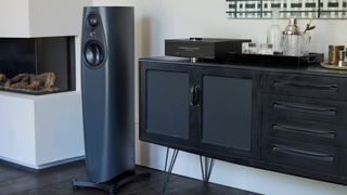 Linn 343 floorstanding speaker next to a hi-fi system