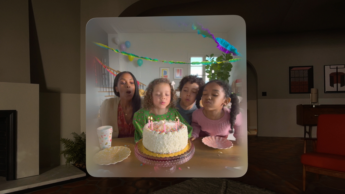 A spatial photo of children blowing out birthday candles taken on the Apple Vision Pro